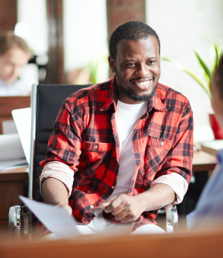 Happy employee smiling at colleague