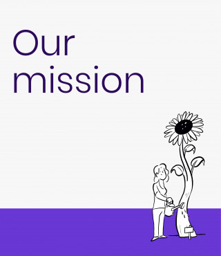 Happy woman watering a sunflower